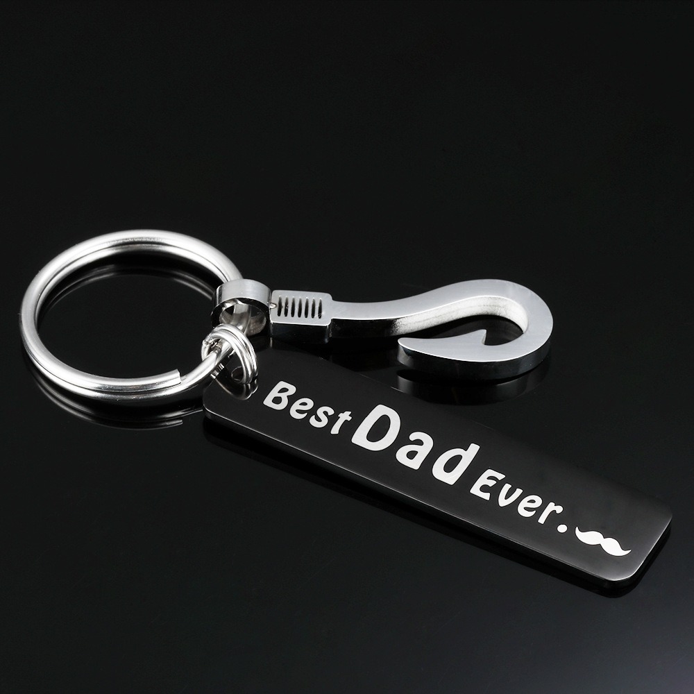 Stainless steel fish hook keychain with a black engraved pendant and birthstone charm