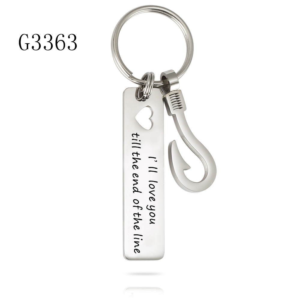 Stainless steel fish hook keychain with a rectangular hollow heart and an engraved name