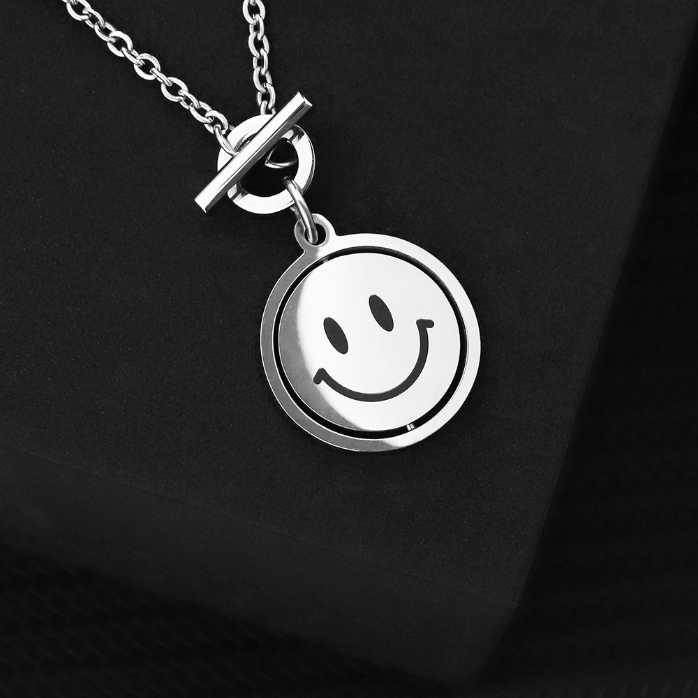 Rotating smile pendant necklace with a photo print