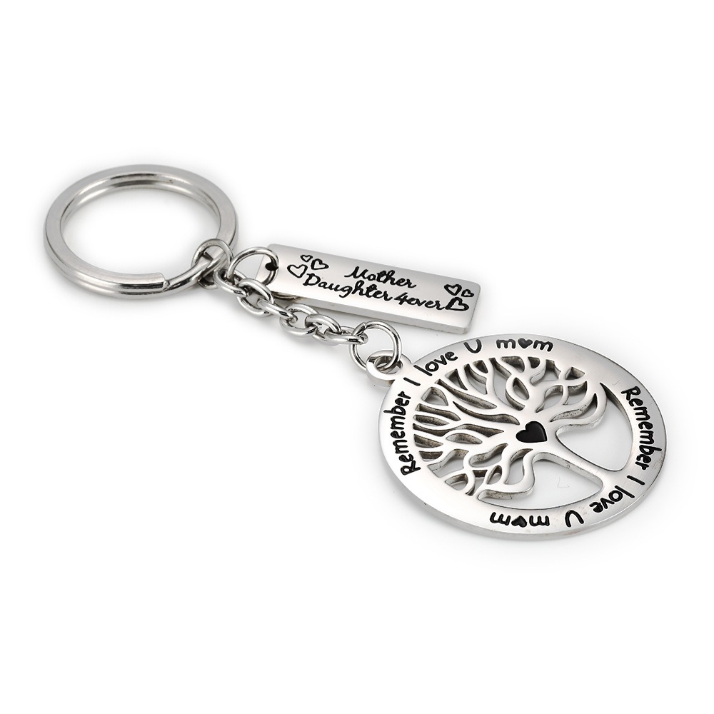 Steel life tree keychain with a single line of engraved text and one birthstone charm