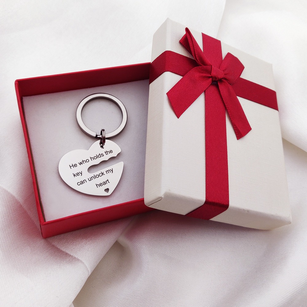 Stainless steel heart lock couple keychain with two engraved names and birthstone accents