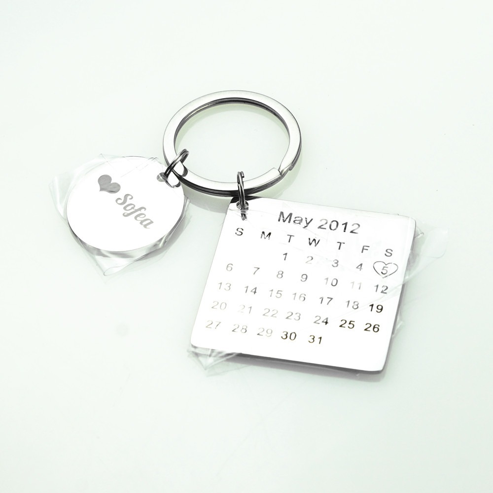 Engraved stainless steel keychain with a birthstone and a heart accent