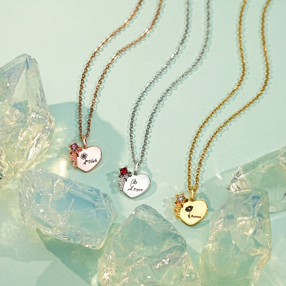Stainless steel name necklace with a cubic zirconia birthstone flower pendant