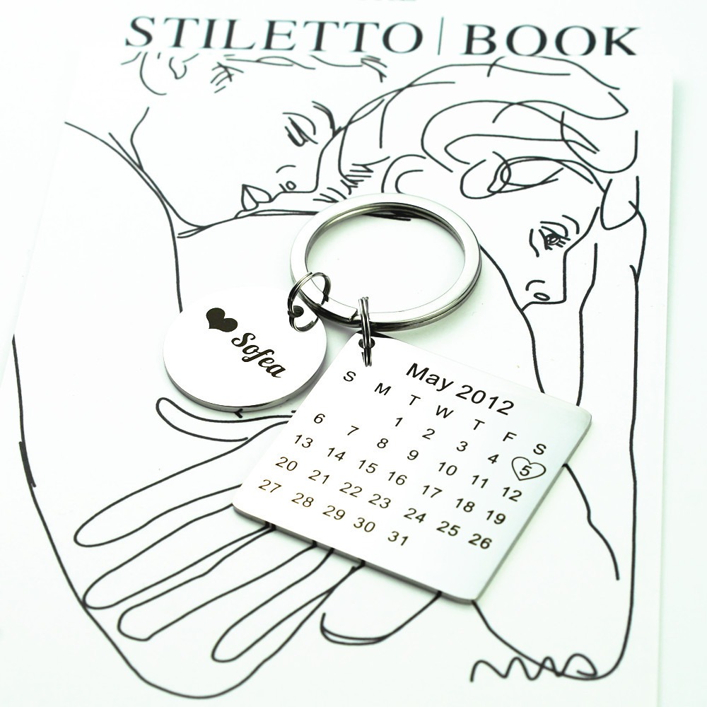 Engraved stainless steel keychain with a birthstone and a heart accent