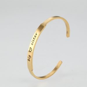 6mm engraved cuff bracelet in gold tone with a single engraved name and birthstone accent