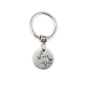 Stainless steel couple set with two engraved heart pendants, birthstones and a coil keychain