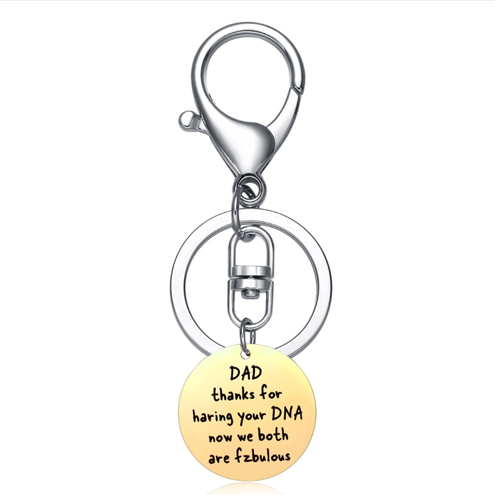 Stainless steel dad keychain with engraved name and a single birthstone charm