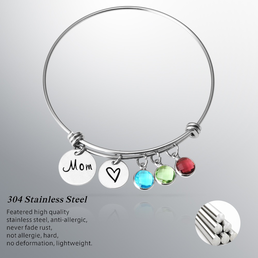 Stainless steel bracelet engraved with a name and set with a single birthstone