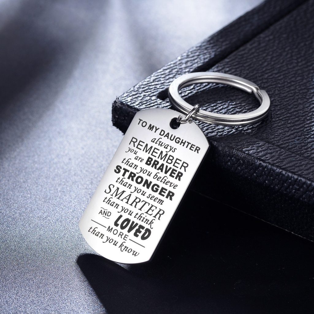 Engraved stainless steel dog tag keychain with a single birthstone accent